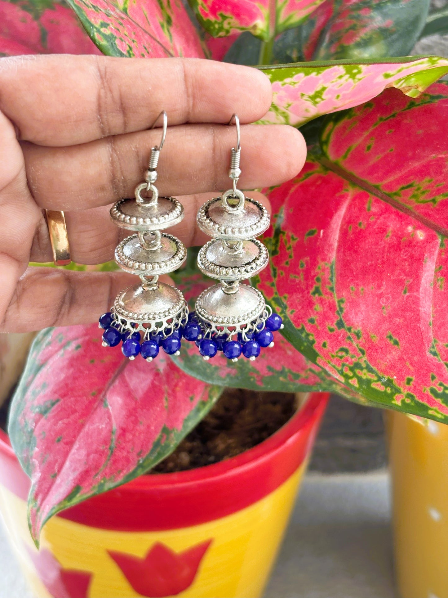 Tiered Oxidized Silver Jhumka Earrings with Blue Beads