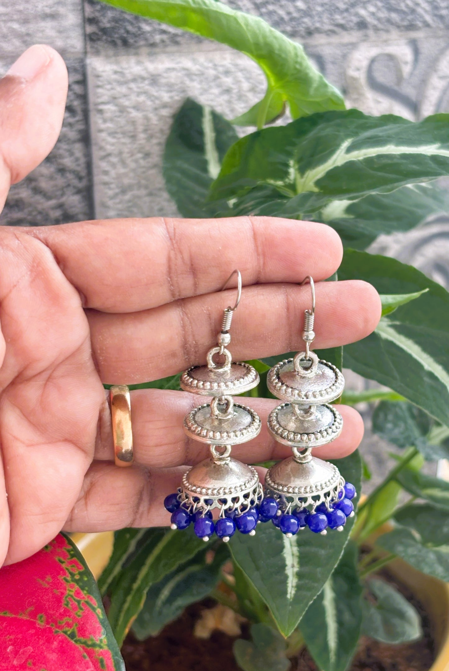 Tiered Oxidized Silver Jhumka Earrings with Blue Beads