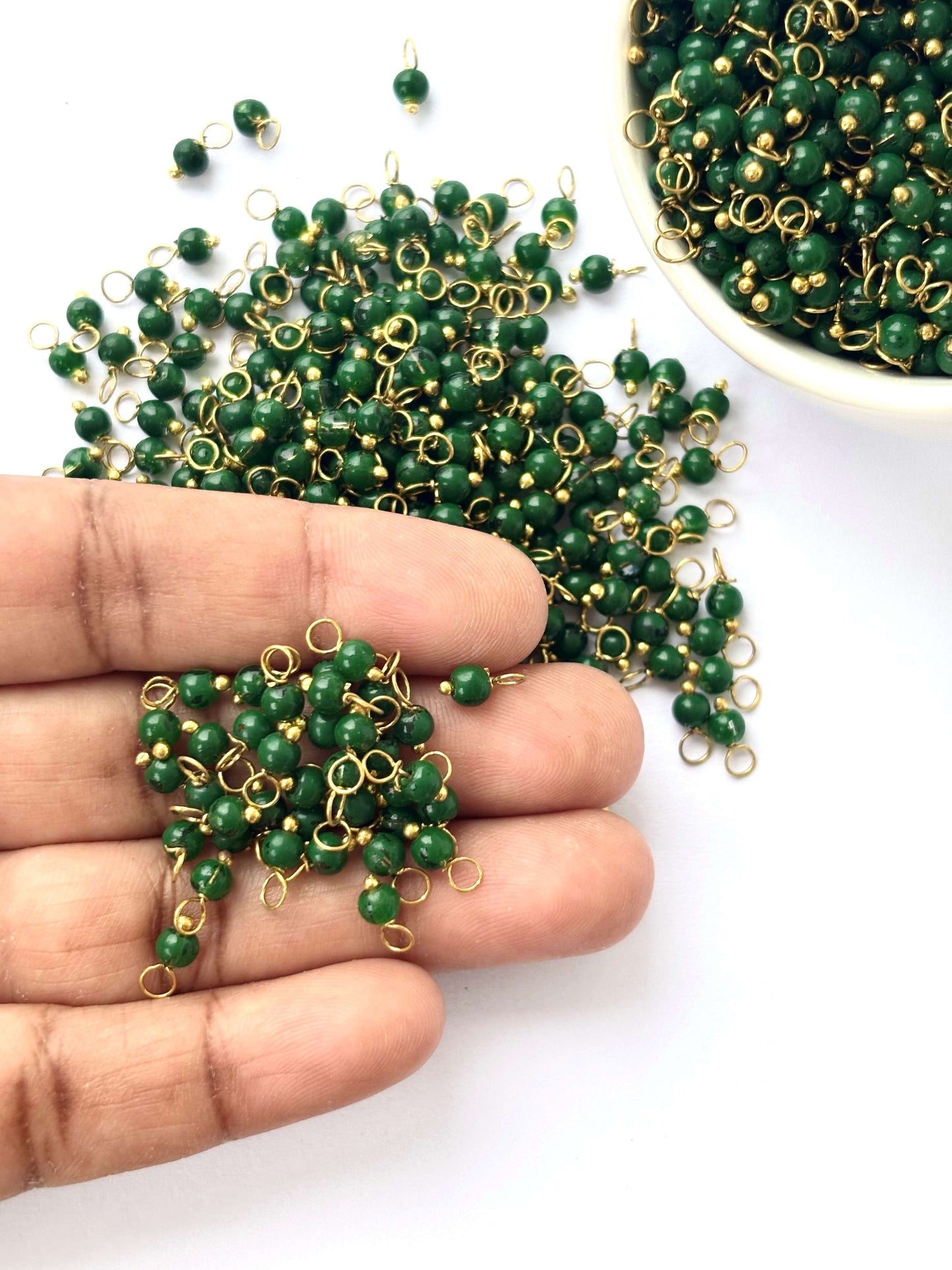 Faceted Kaitoke Green Charms with Golden Wire