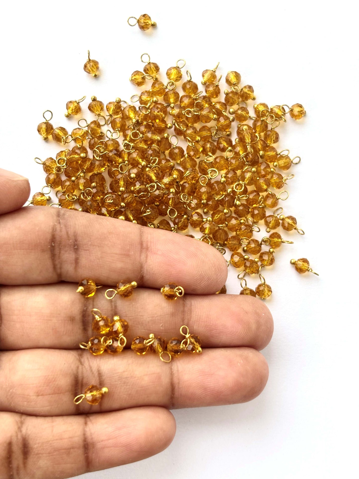 Faceted Ginger Brown Charms with Golden Wire