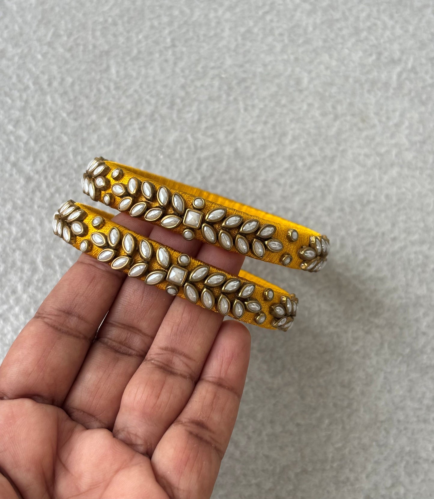 Yellow Silk Thread Bangles with Kundan and Pearl Work