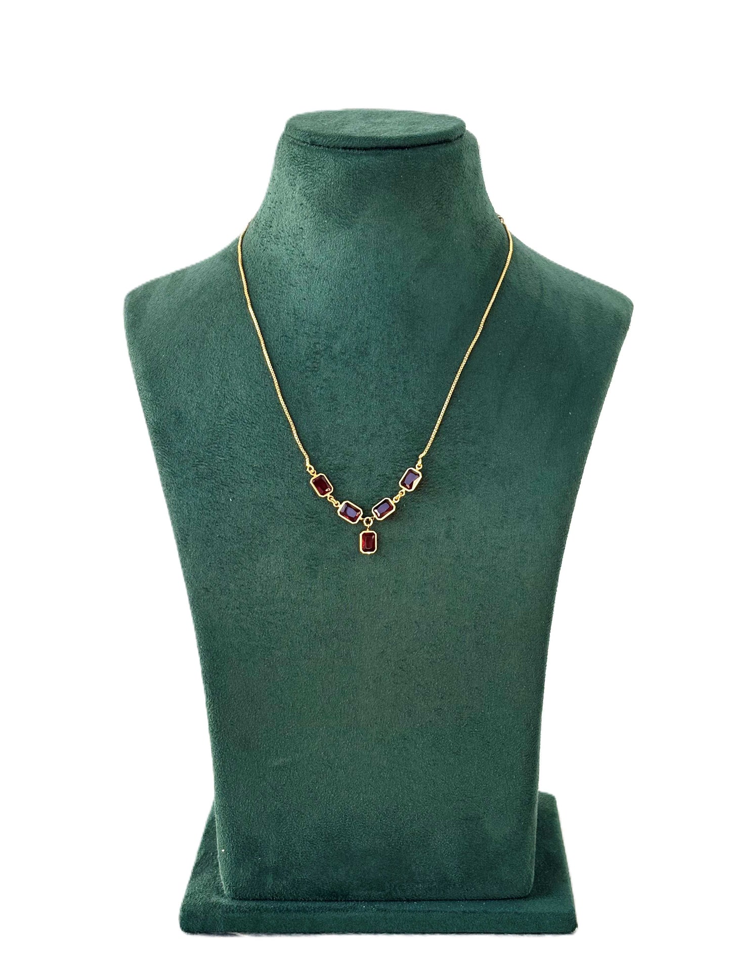 Gold Necklace with Vibrant Red Emerald-Cut Stones