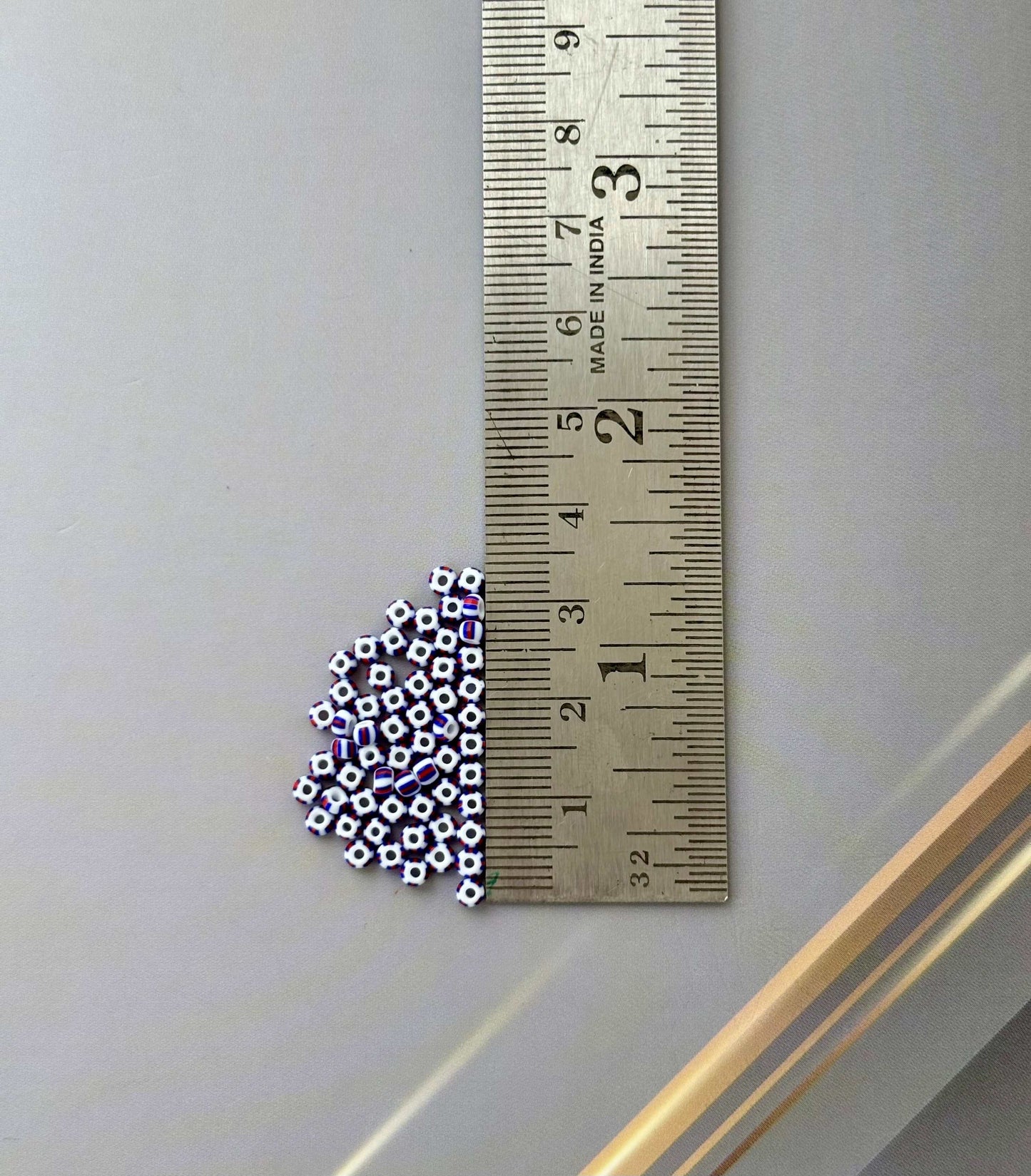 Preciosa White with Blue and Red Thick Stripe Seed Beads