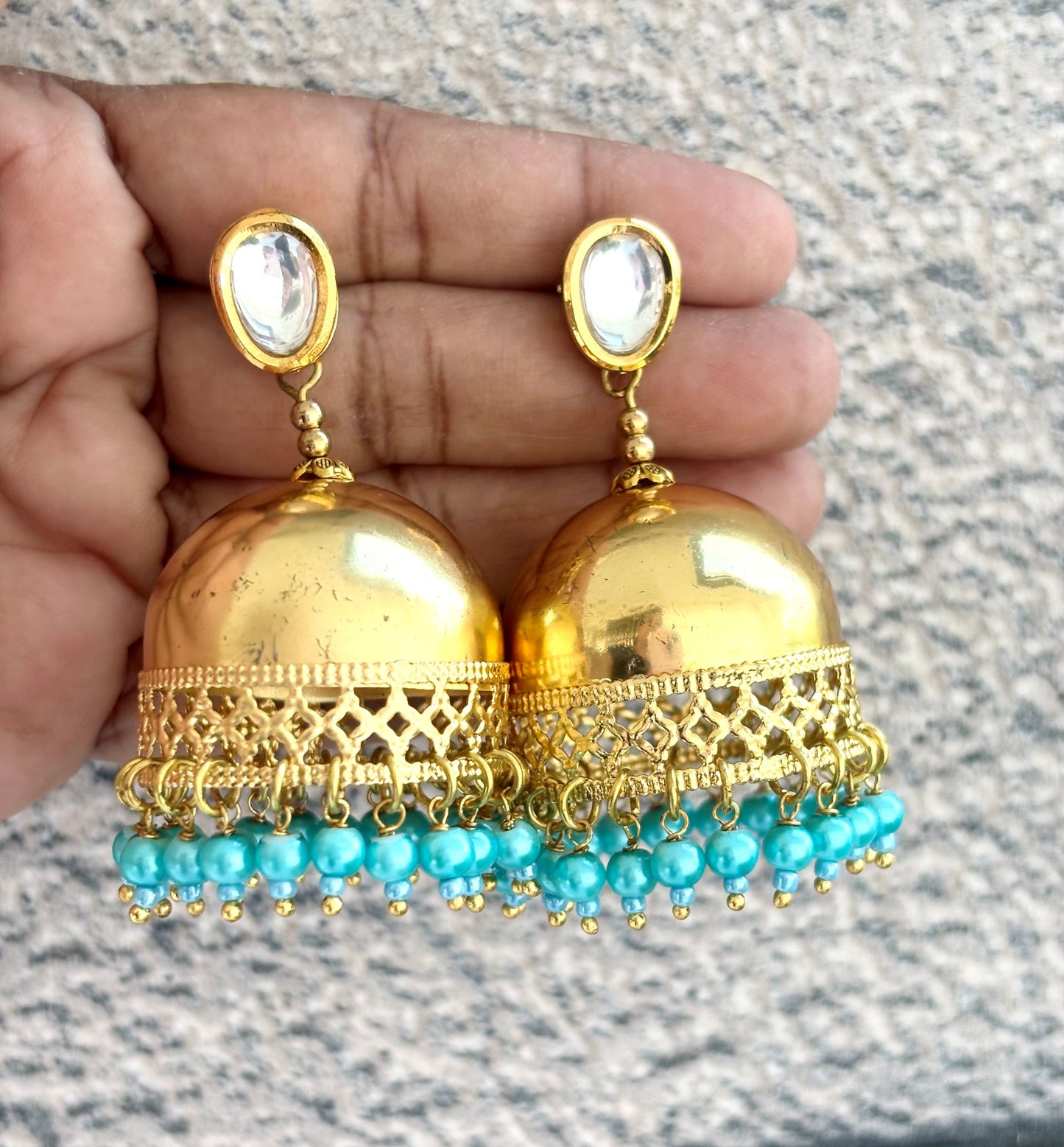 Statement Gold Jhumka Earrings with Blue Beads