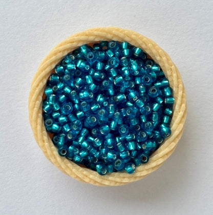 Teal Preciosa Seed Beads with Silver Lining