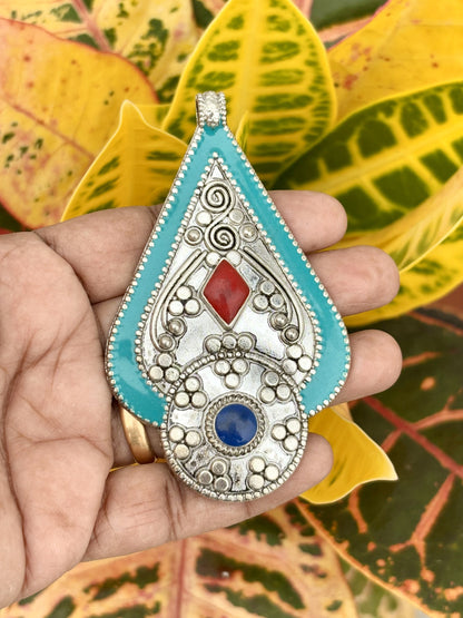 Handcrafted Afghan Pendant with Red and Blue Stones