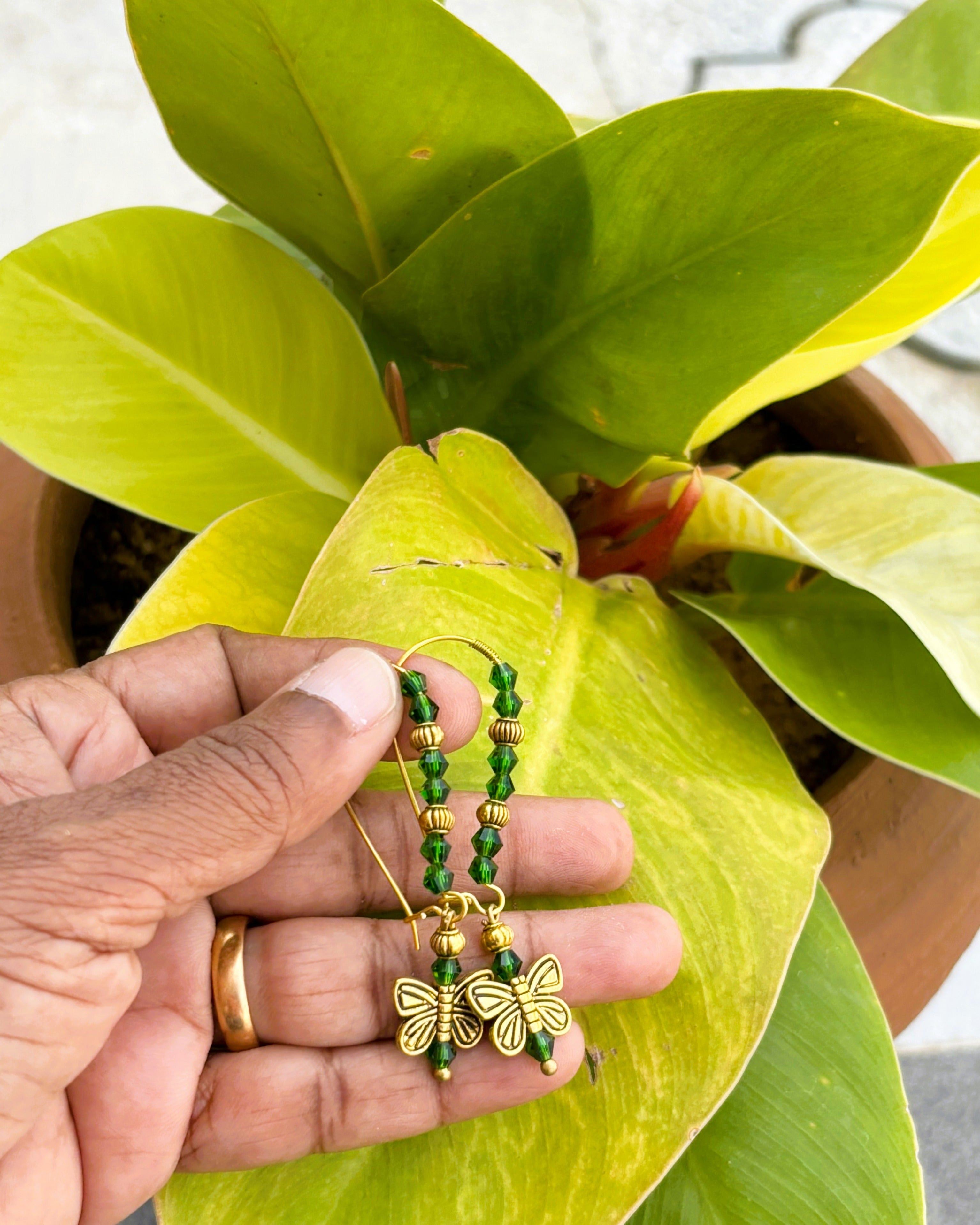 Gold French Hook Earrings with Green Beads and Butterfly Charms