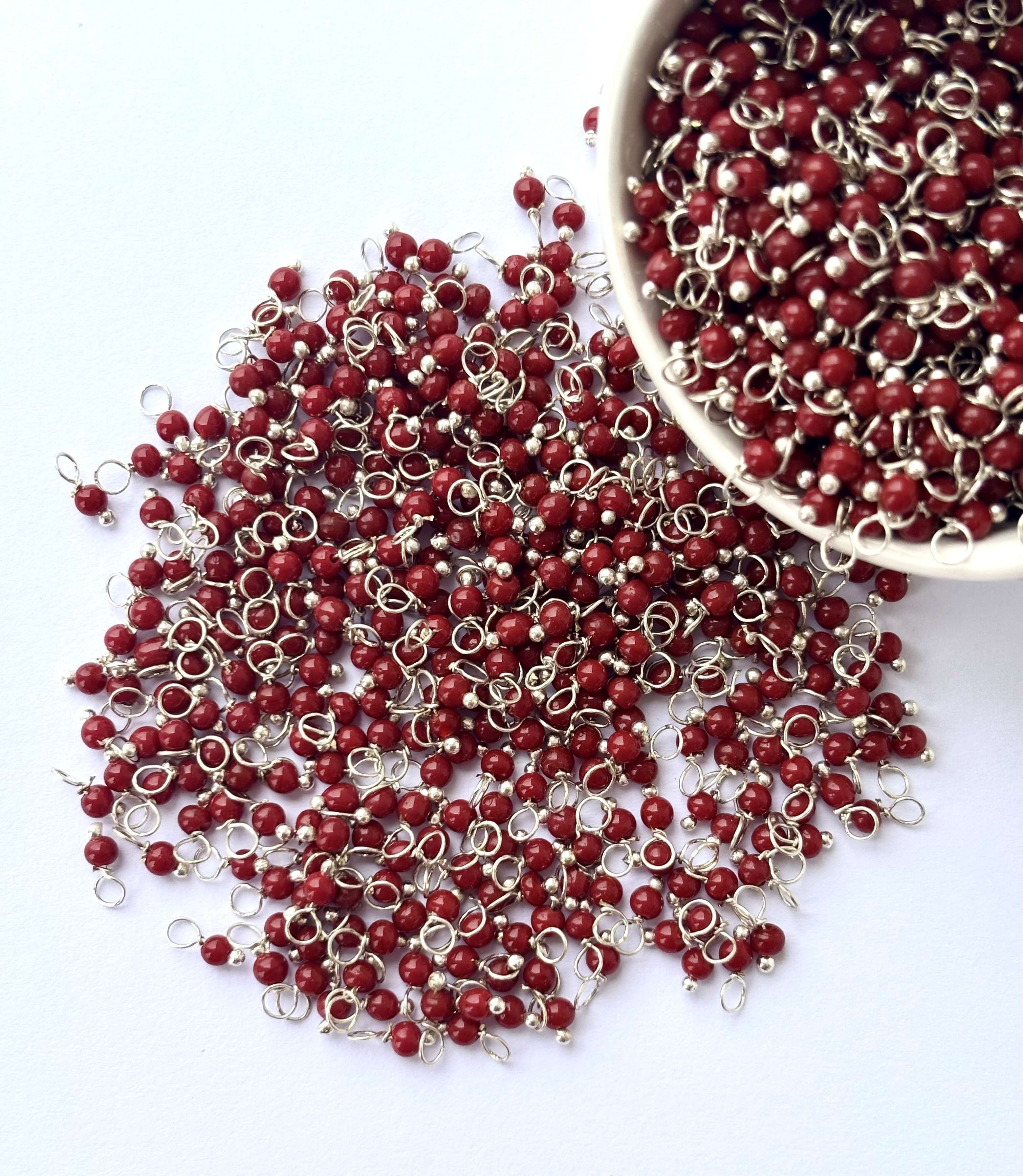 Faceted Falu Red Charms with Silver Wire