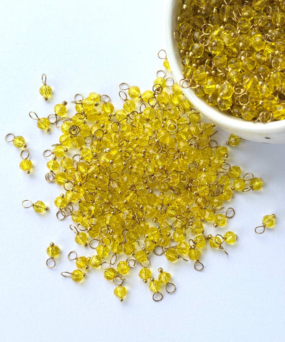 Faceted Cadium Yellow Charms with Golden Wire