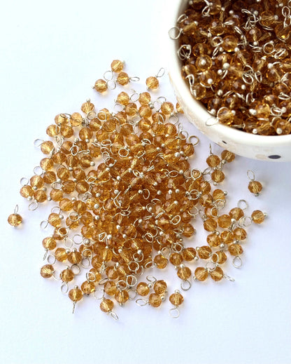 Faceted Copper Brown Charms with Silver Wire