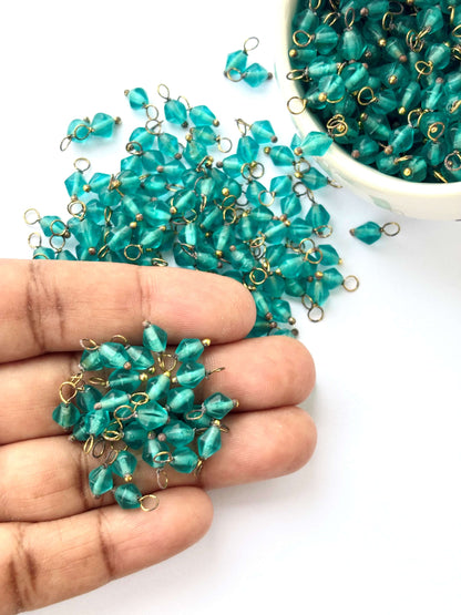 Bicone Tropical Teal Charms with Golden Wire