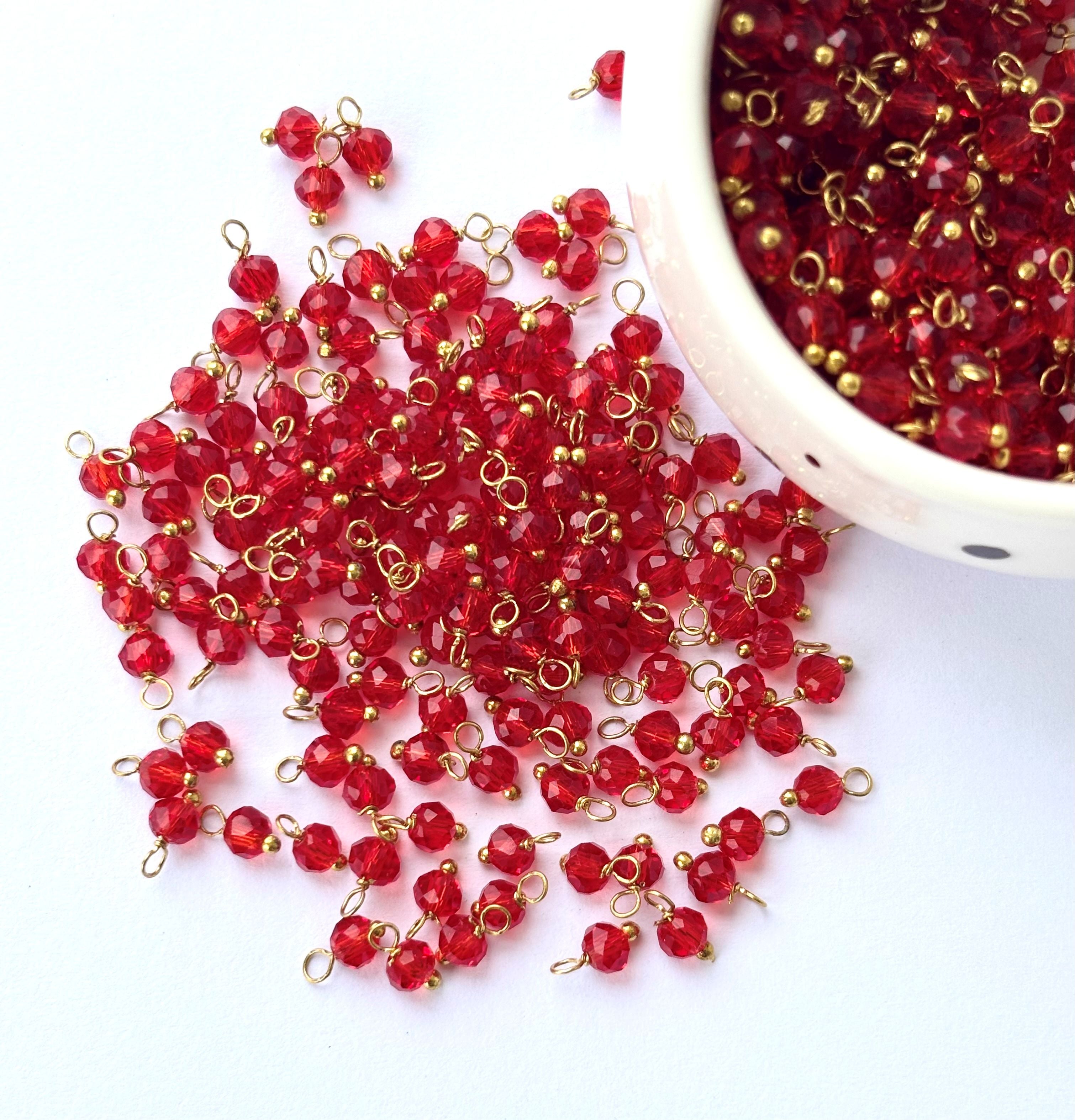 Faceted Rufous Red Charms with Golden Wire