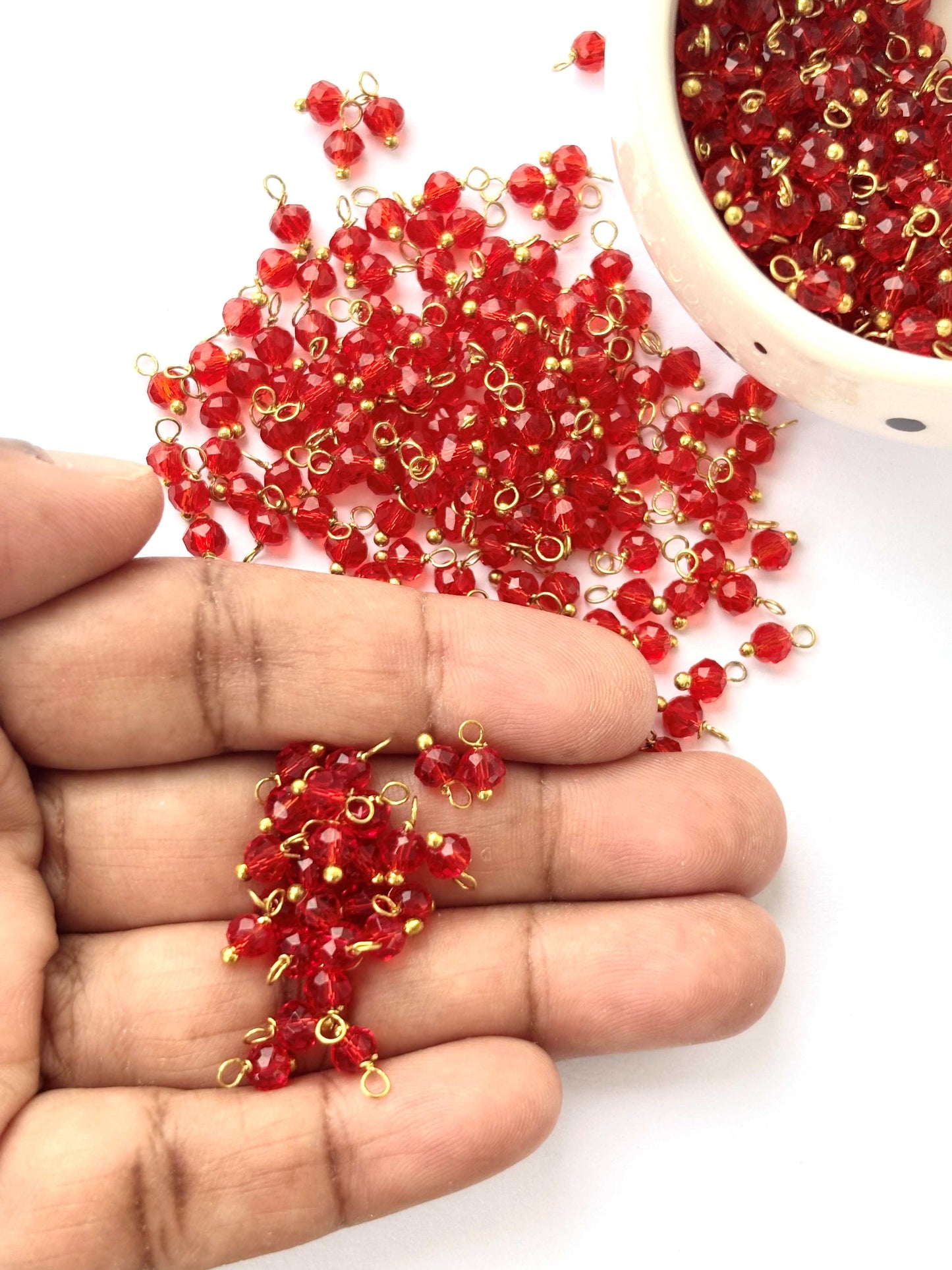 Faceted Rufous Red Charms with Golden Wire