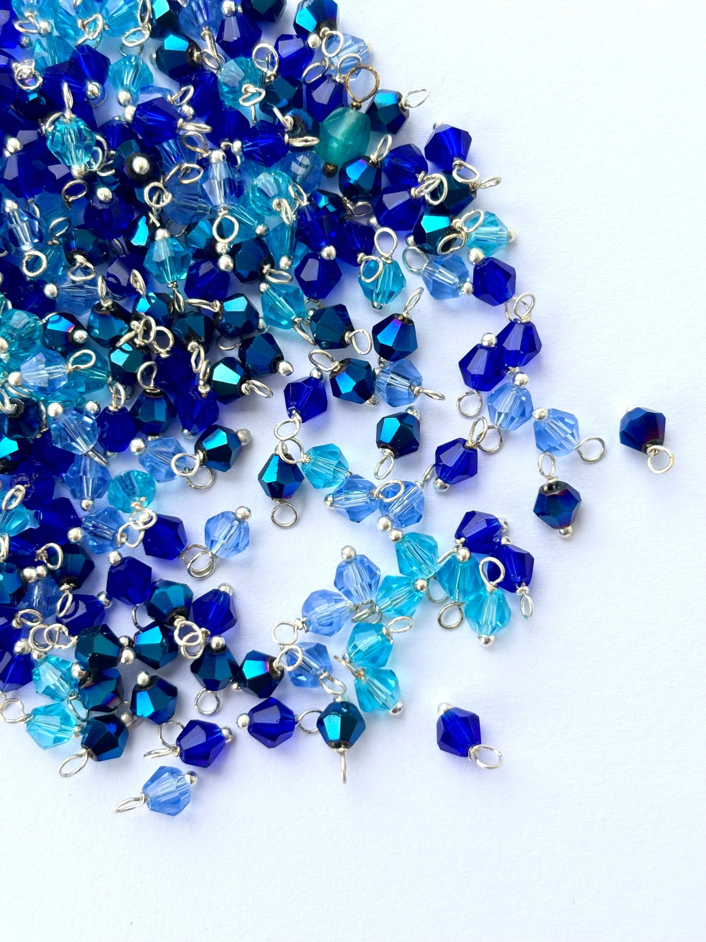 Blue Bicone Charms with Silver Wire