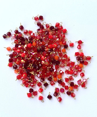 Multi Red Bicone Charms with Golden Wire