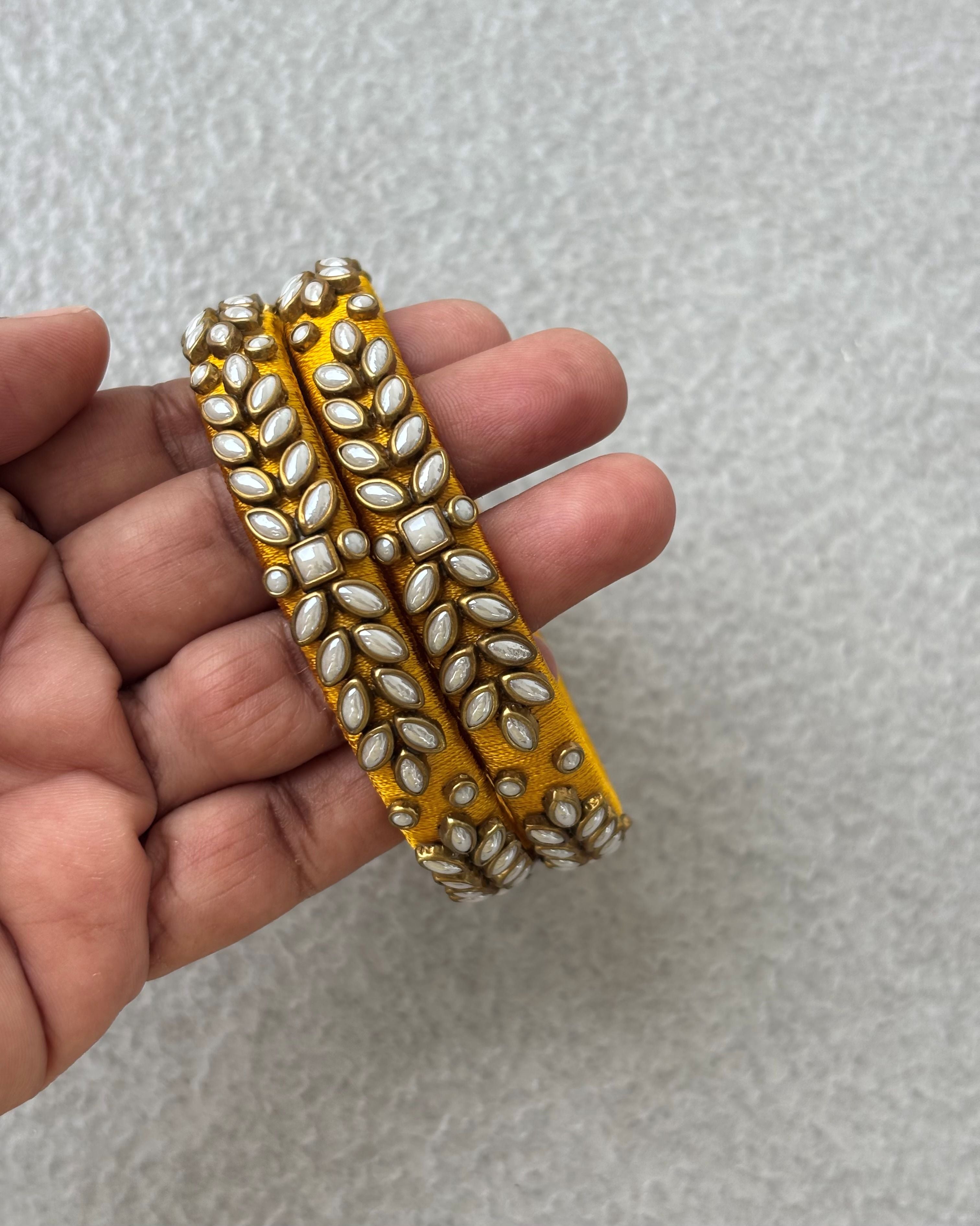 Yellow Silk Thread Bangles with Kundan and Pearl Work