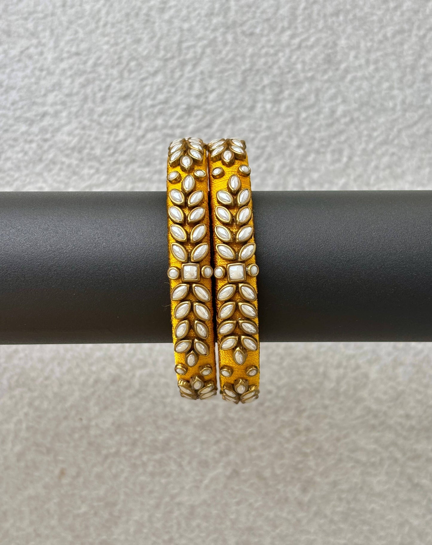 Yellow Silk Thread Bangles with Kundan and Pearl Work
