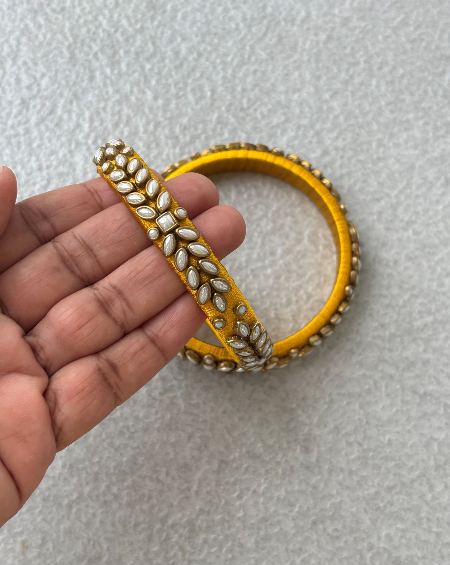 Yellow Silk Thread Bangles with Kundan and Pearl Work