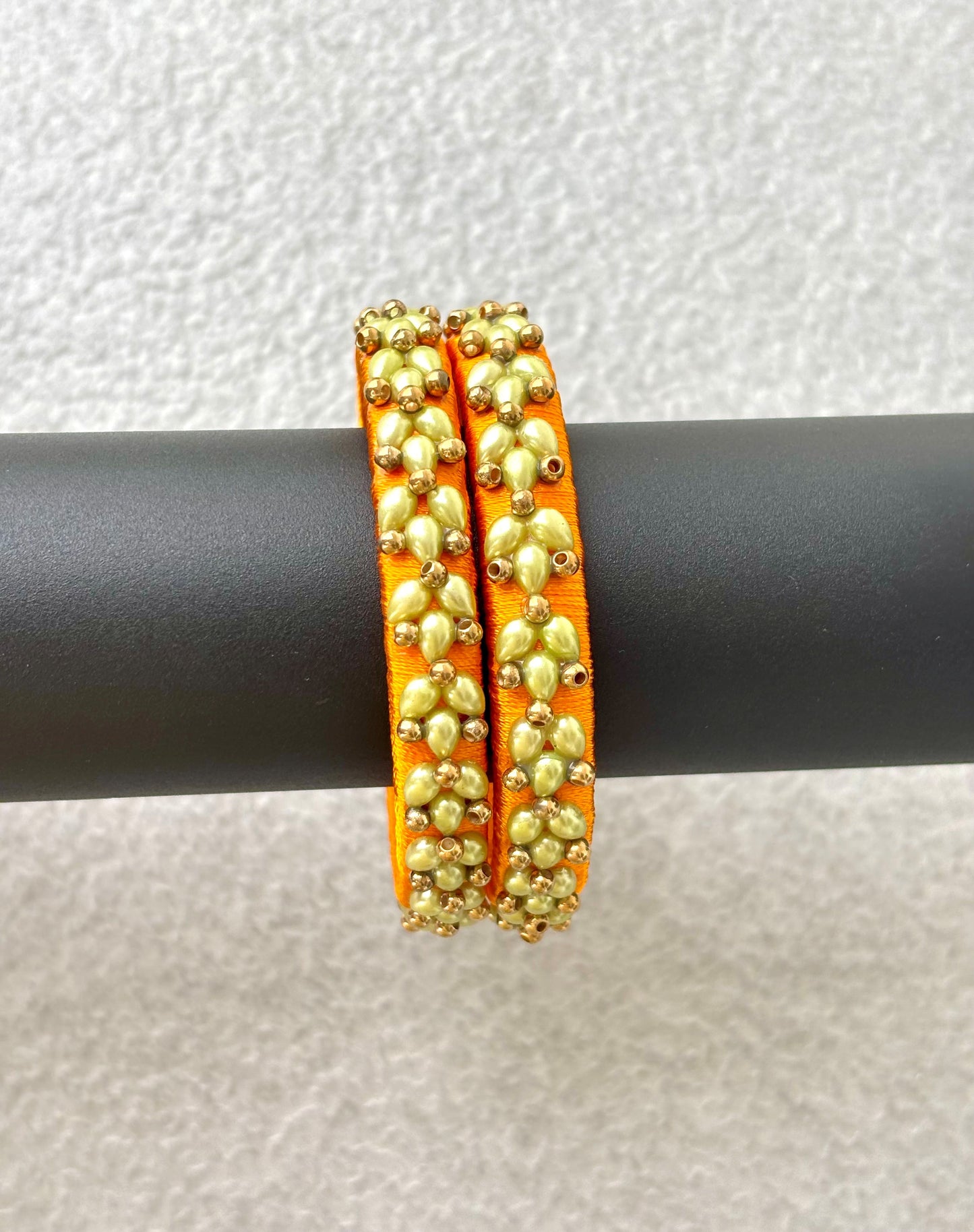 Orange Silk Thread Bangles with Petal Work