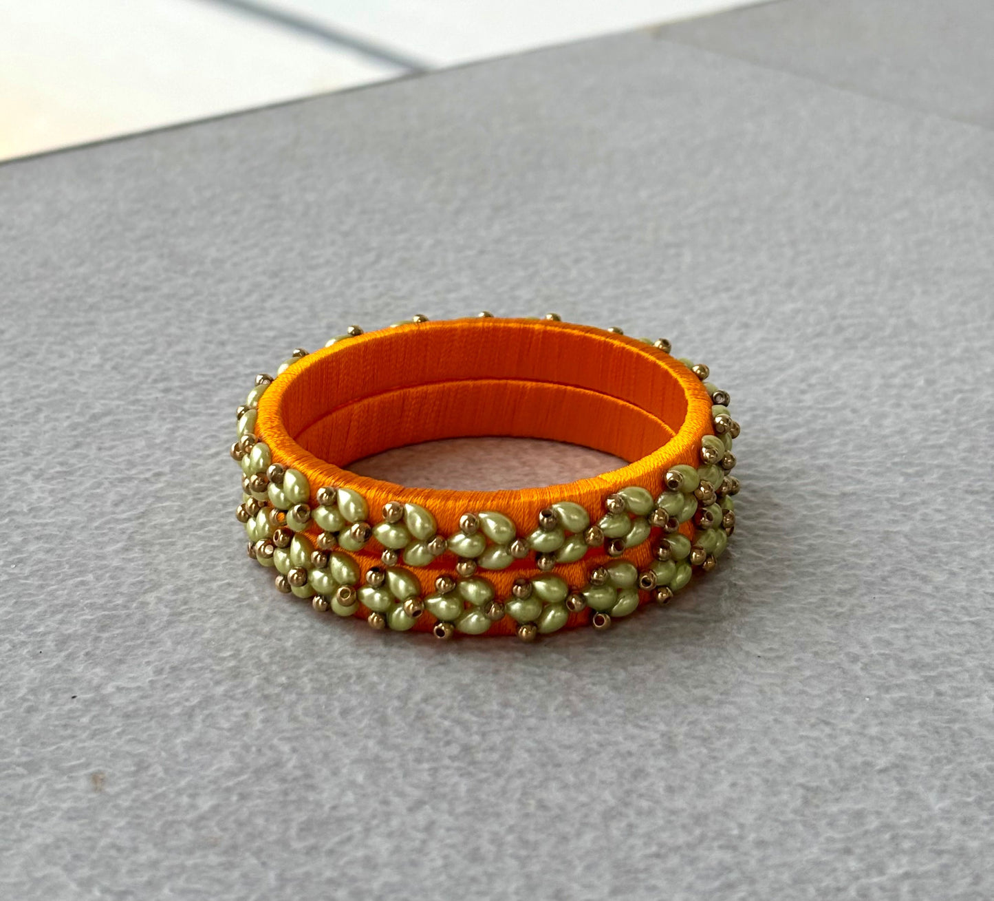 Orange Silk Thread Bangles with Petal Work