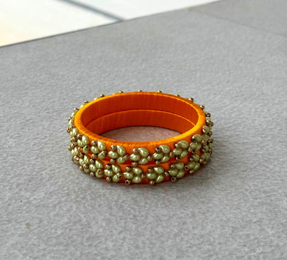 Orange Silk Thread Bangles with Petal Work