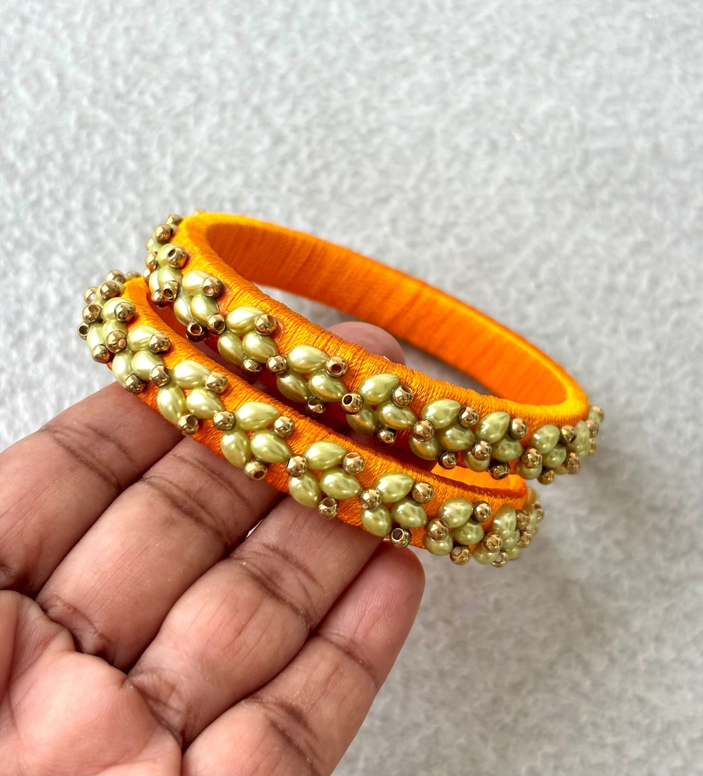 Orange Silk Thread Bangles with Petal Work