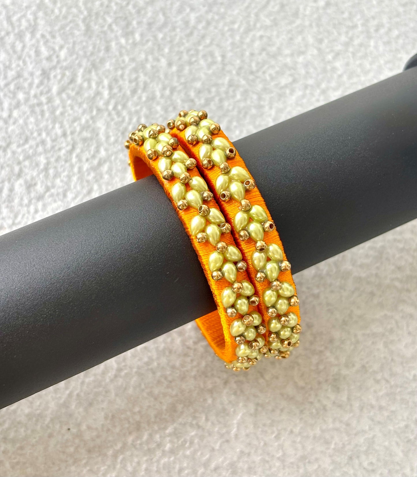 Orange Silk Thread Bangles with Petal Work