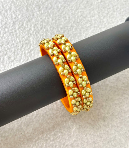 Orange Silk Thread Bangles with Petal Work