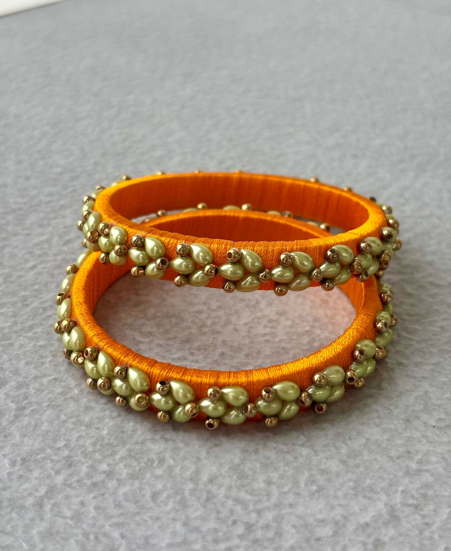 Orange Silk Thread Bangles with Petal Work