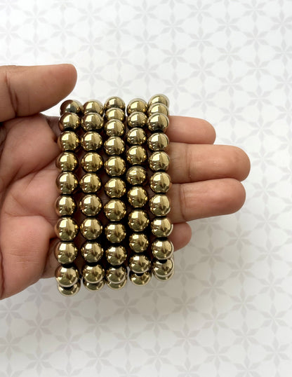 Polished Gold-Toned Beaded Bracelet