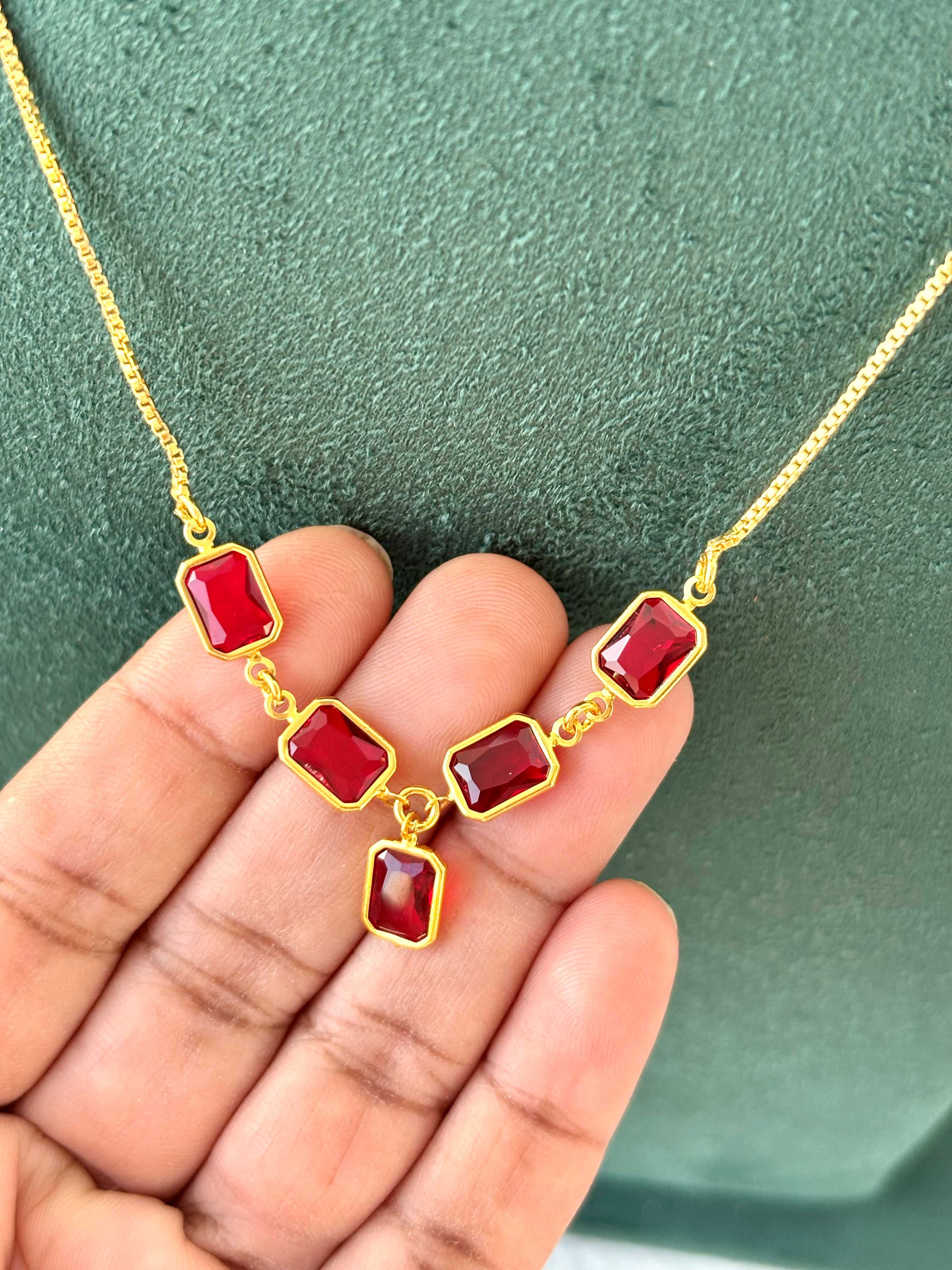 Gold Necklace with Vibrant Red Emerald-Cut Stones