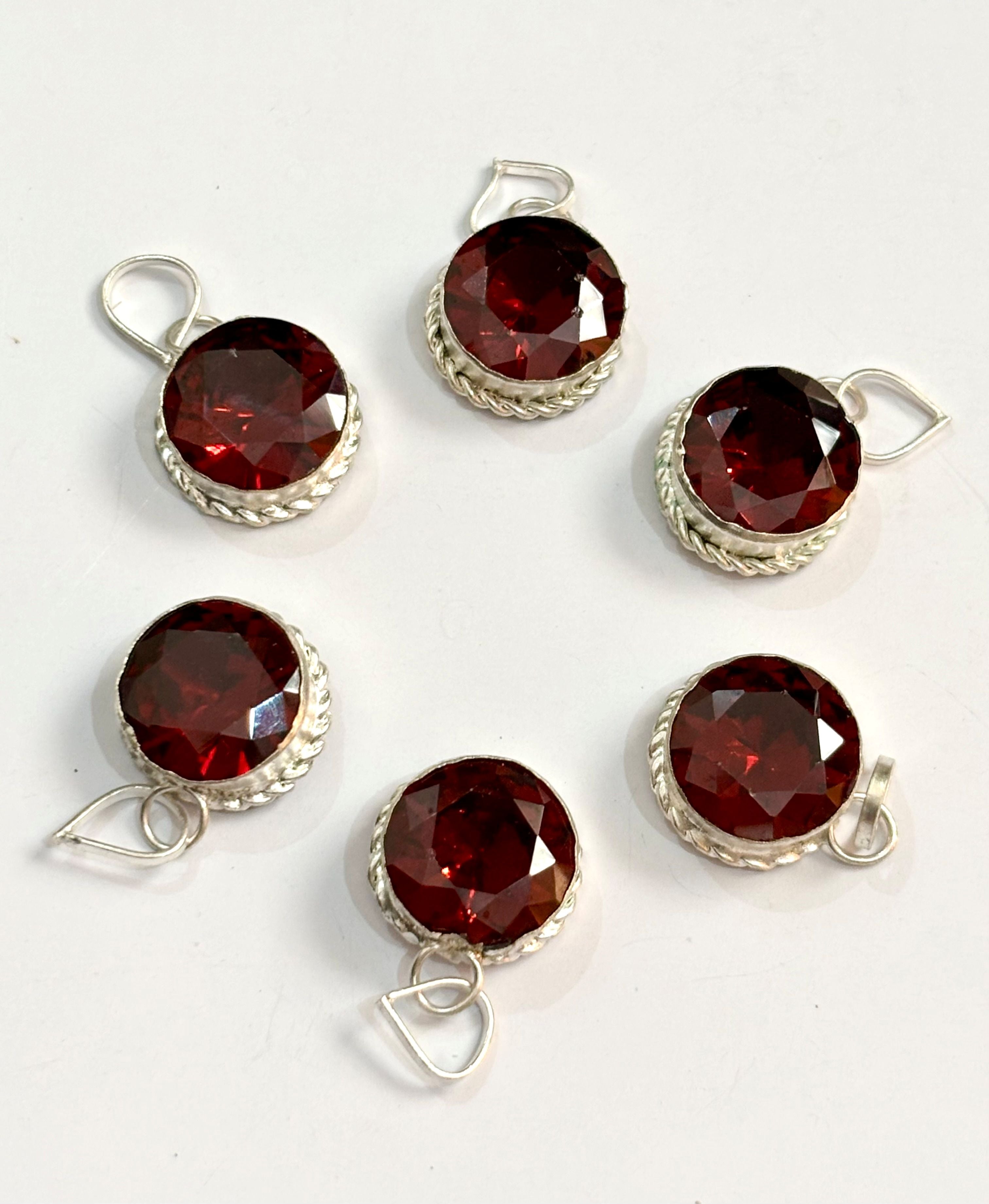 Sparkling Faceted Maroon Stone Pendants