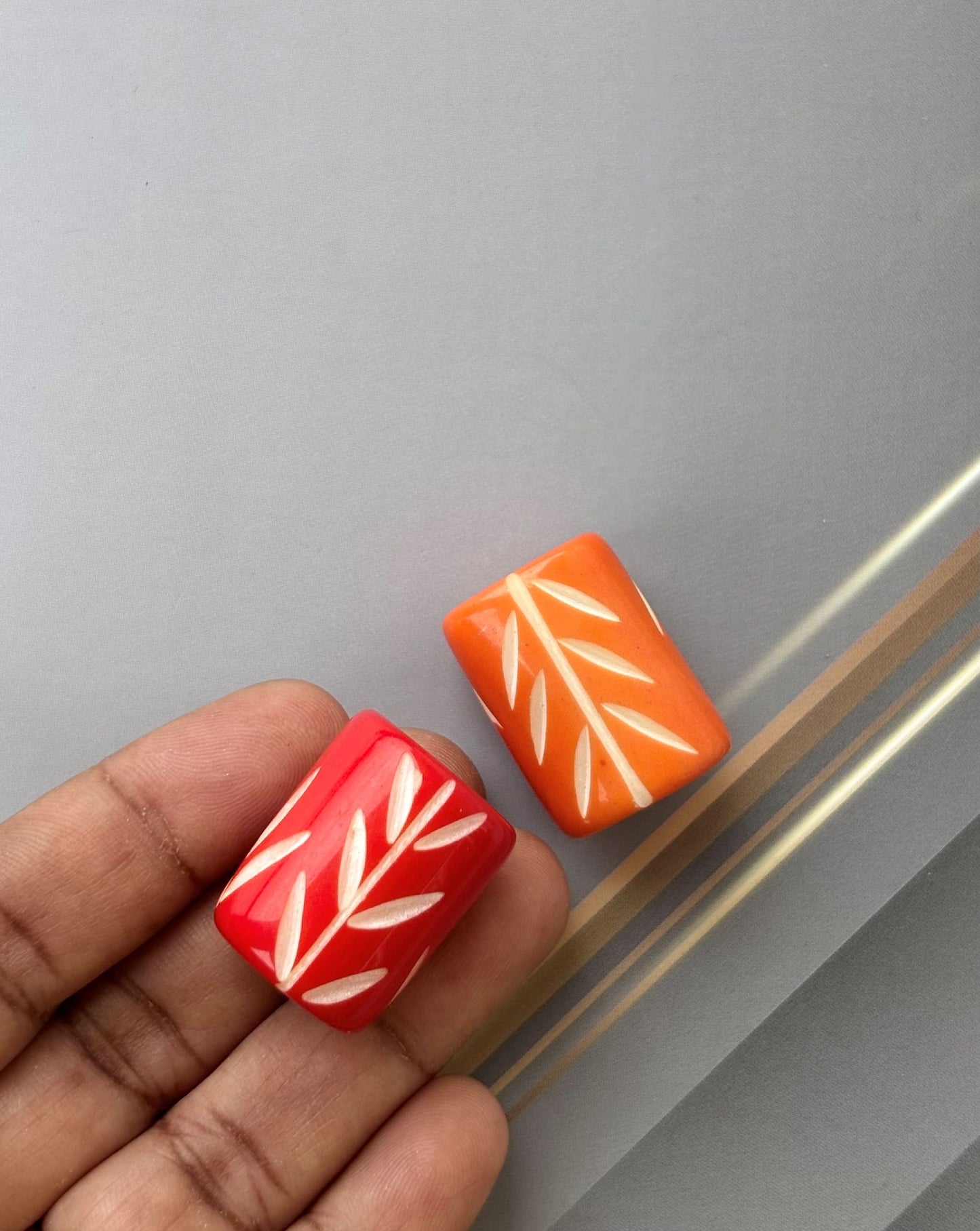 Red and Orange Cylindrical Beads with Hand Carved Leaf Pattern for Jewelry Making