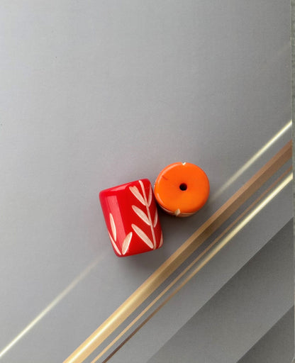 Red and Orange Cylindrical Beads with Hand Carved Leaf Pattern for Jewelry Making
