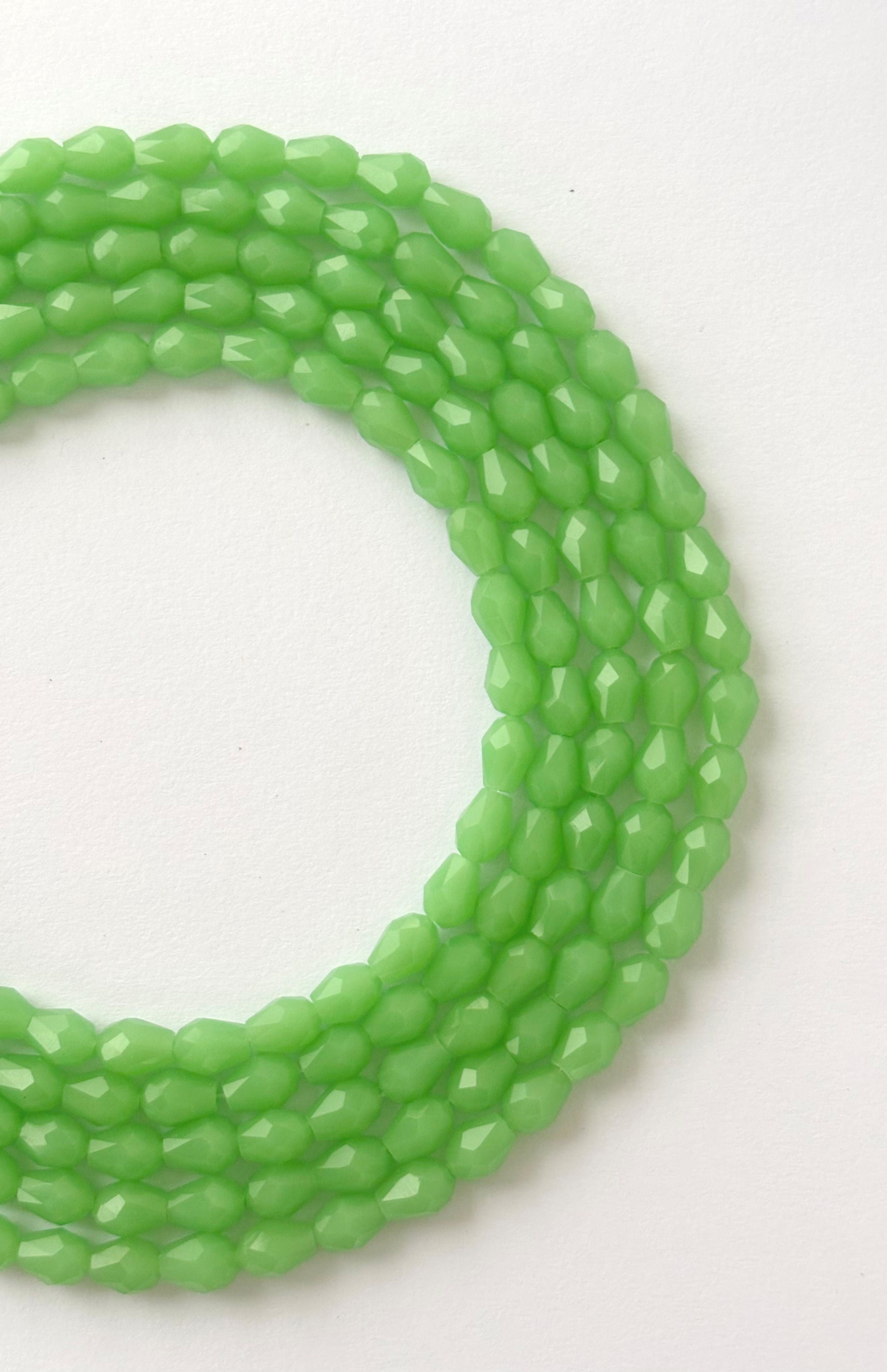 Vibrant Peridot Green Faceted Crystals