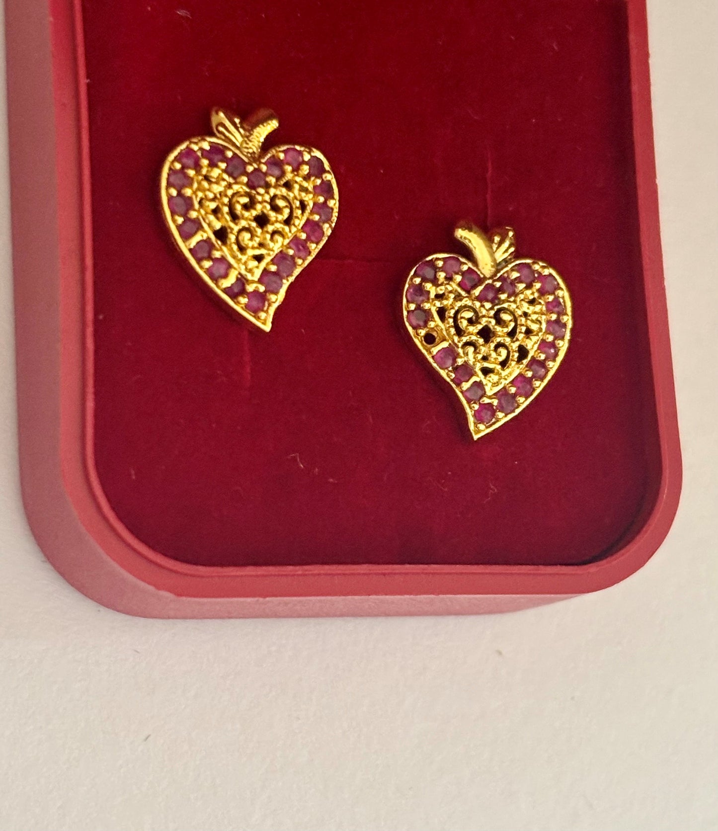 Gold-Plated Filigree Heart Earrings with Ruby Stones