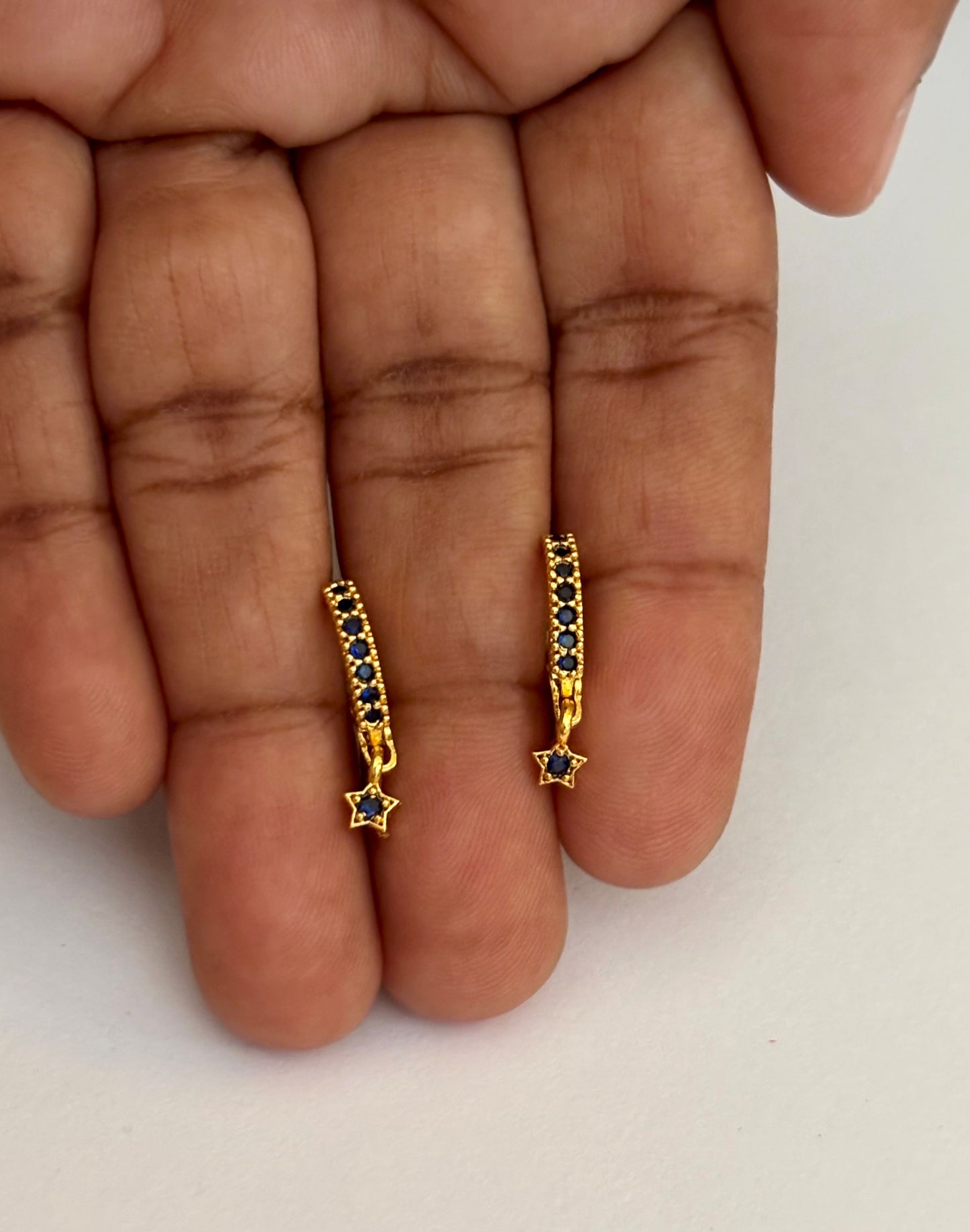 Star Charm Huggie Earrings with Blue Sapphire Stones