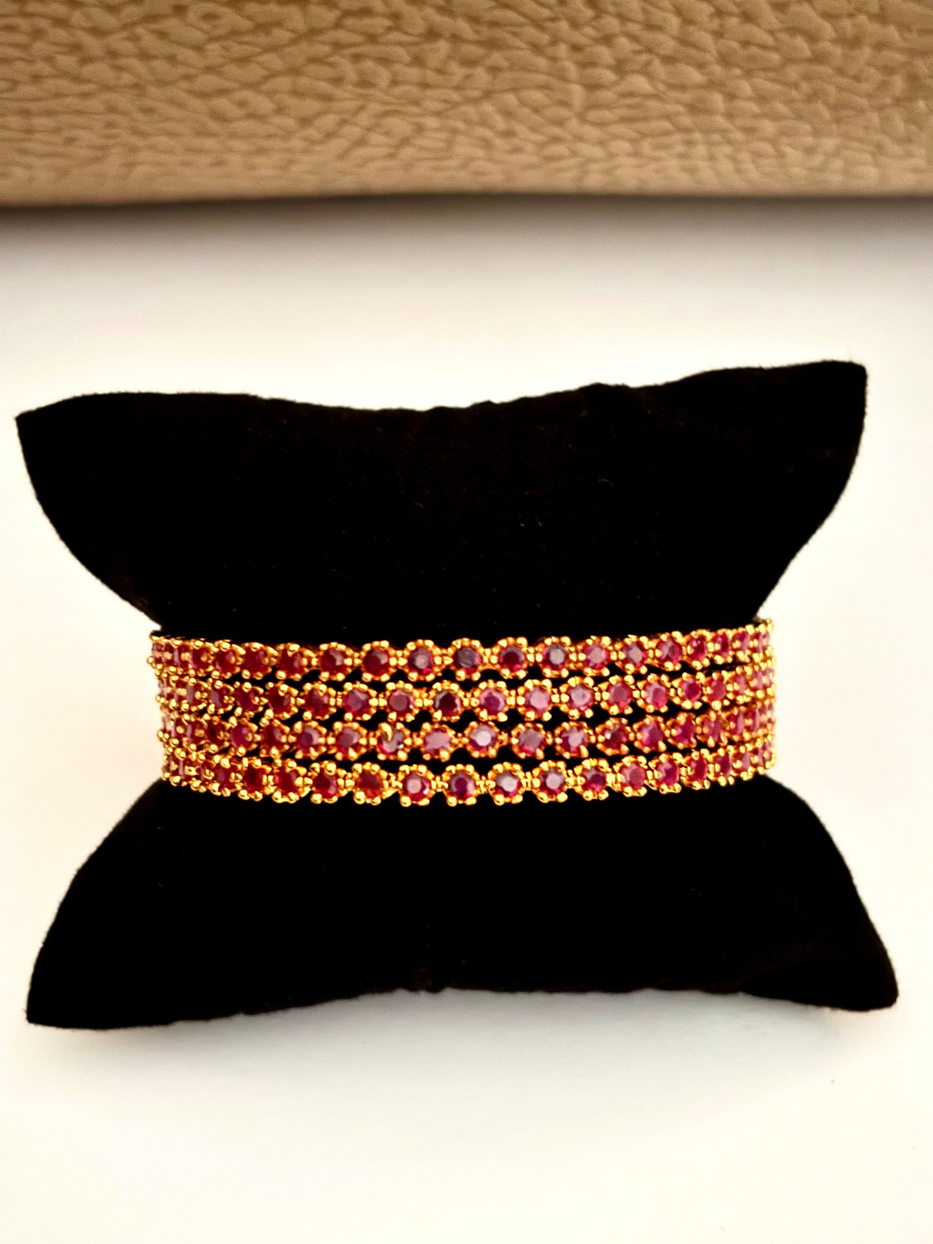 Gold-Plated Bangle Fully Studded with Ruby Pink Stones