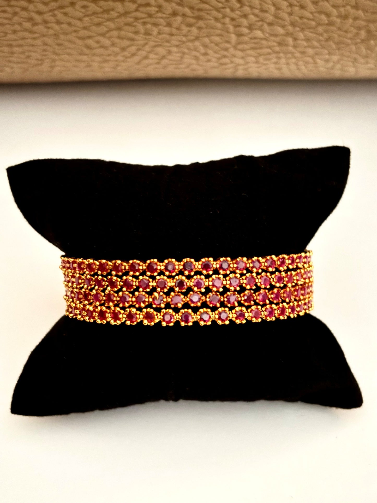 Gold-Plated Bangle Fully Studded with Ruby Pink Stones