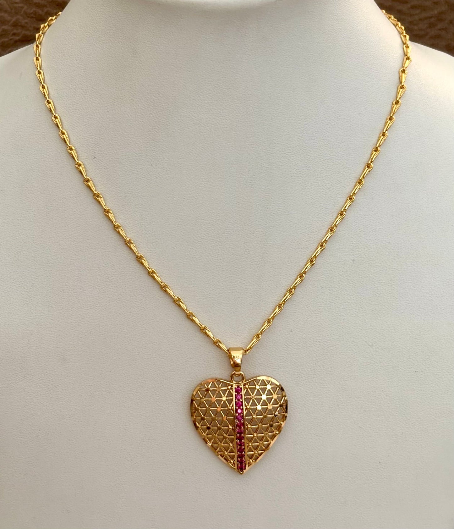 Gold-Plated Filigree Heart Pendant with Pink Ruby Stripe