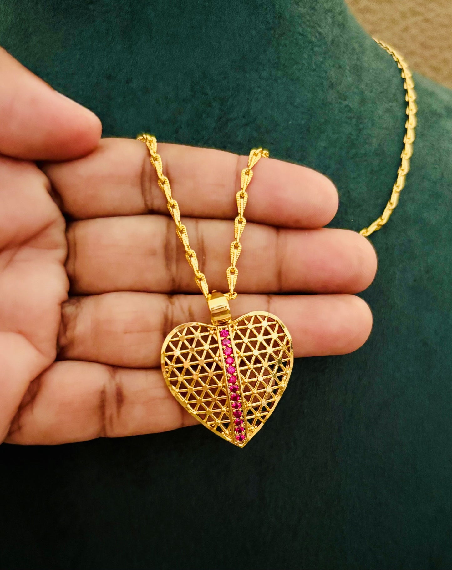 Gold-Plated Filigree Heart Pendant with Pink Ruby Stripe