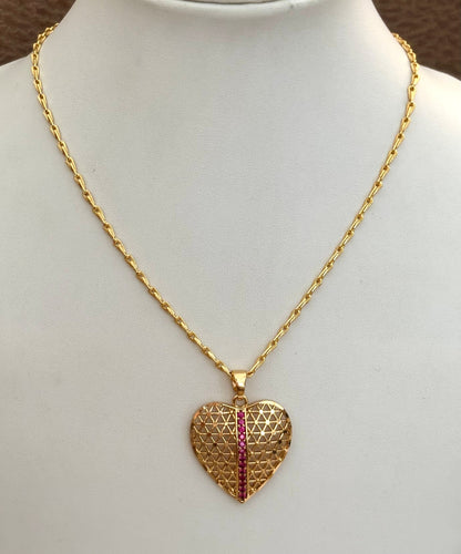 Gold-Plated Filigree Heart Pendant with Pink Ruby Stripe