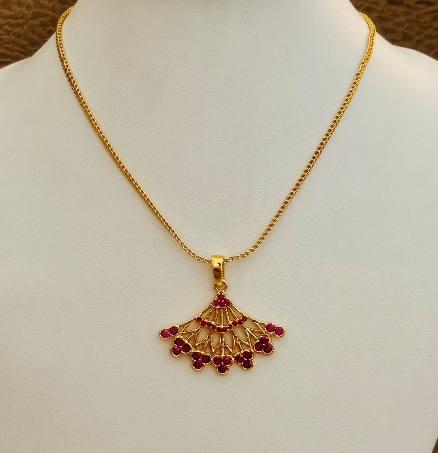 Gold-Plated Fan-Shaped Pendant with Pink Ruby Stones