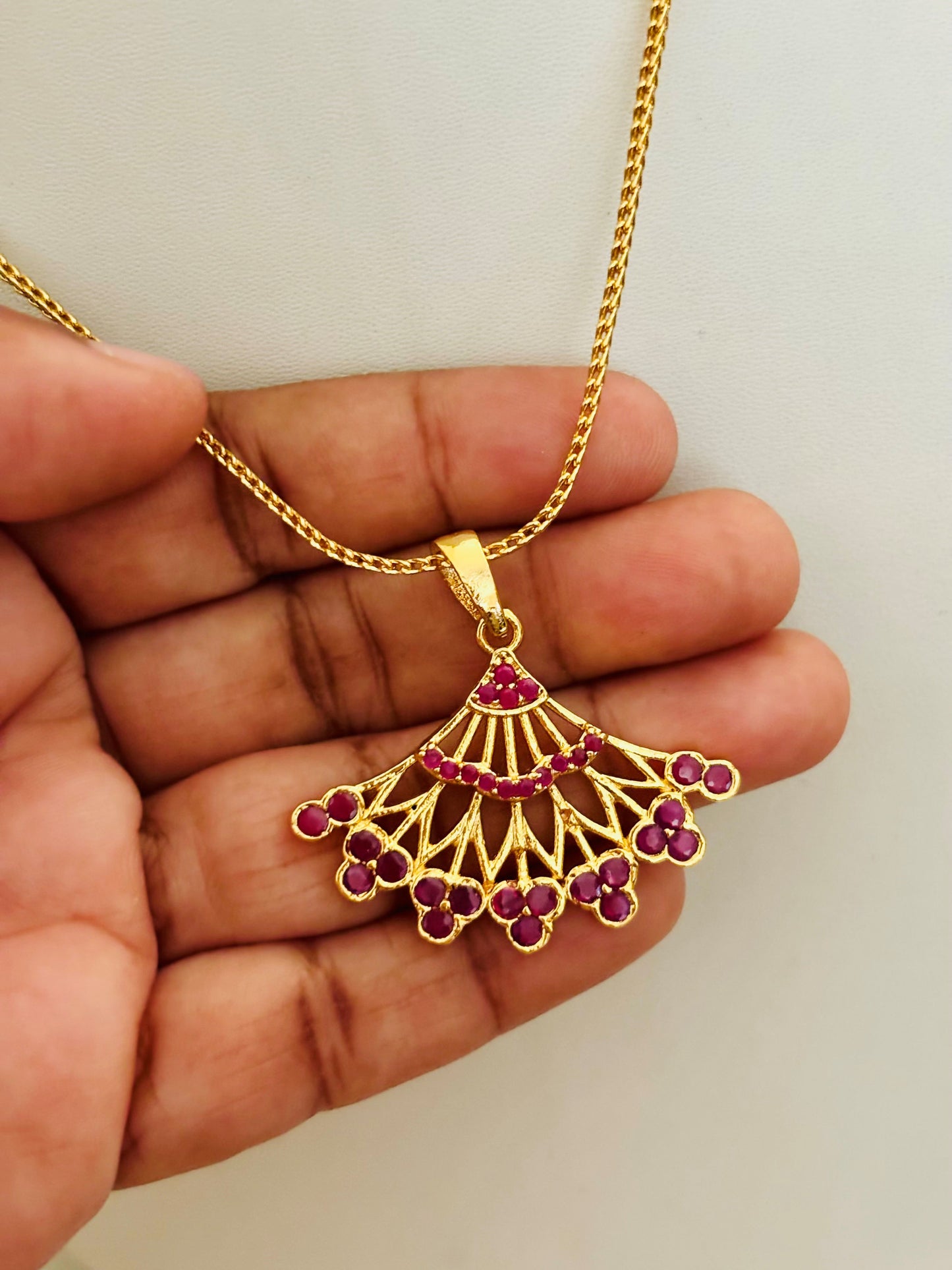 Gold-Plated Fan-Shaped Pendant with Pink Ruby Stones