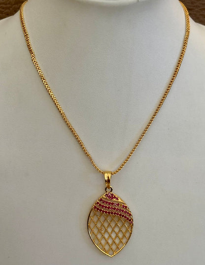 Gold-Plated Jali Work Pendant with Pink Ruby Stones