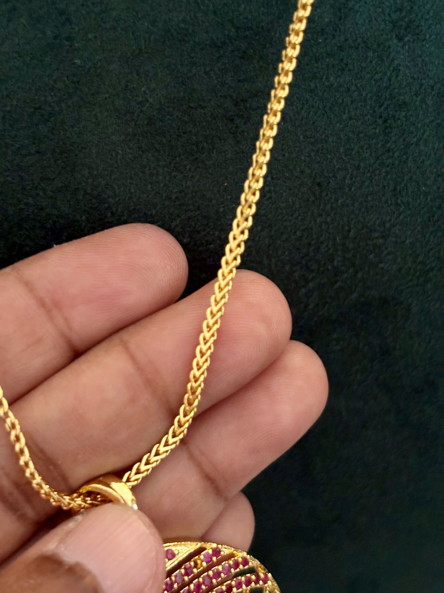 Gold-Plated Jali Work Pendant with Pink Ruby Stones