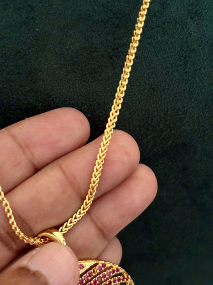 Gold-Plated Jali Work Pendant with Pink Ruby Stones