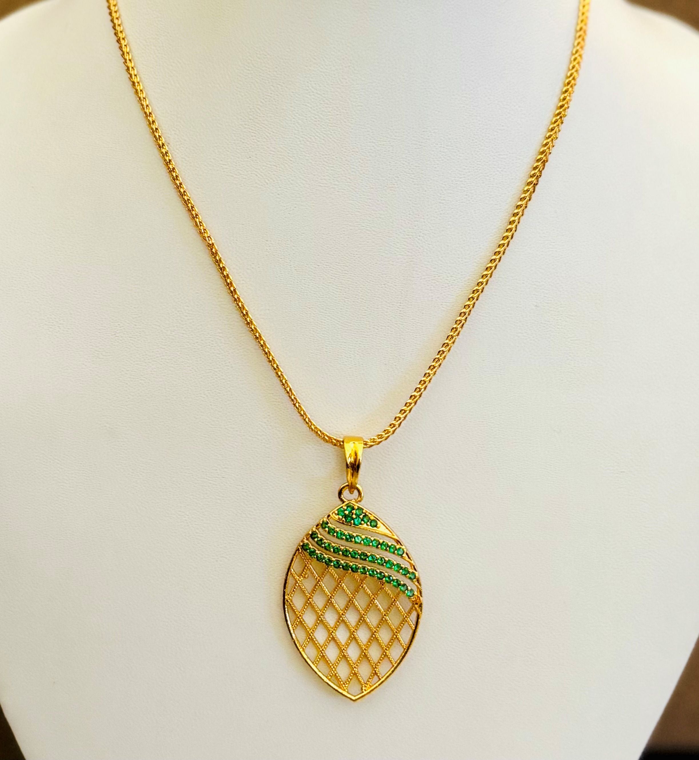Gold-Plated Jali Work Pendant with Green Emerald Stones