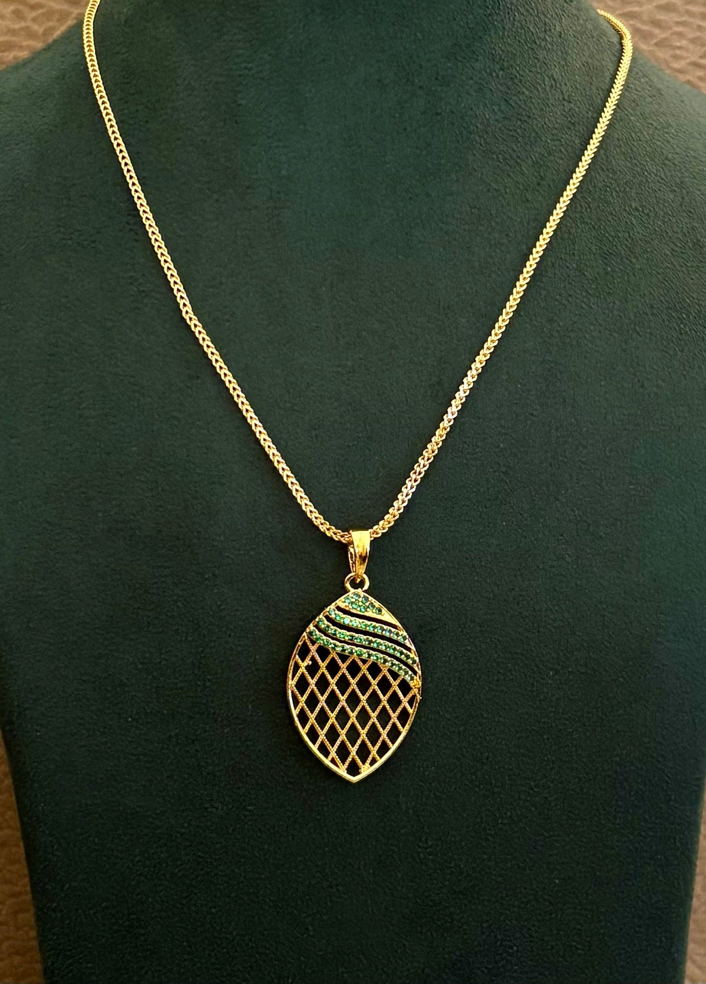 Gold-Plated Jali Work Pendant with Green Emerald Stones