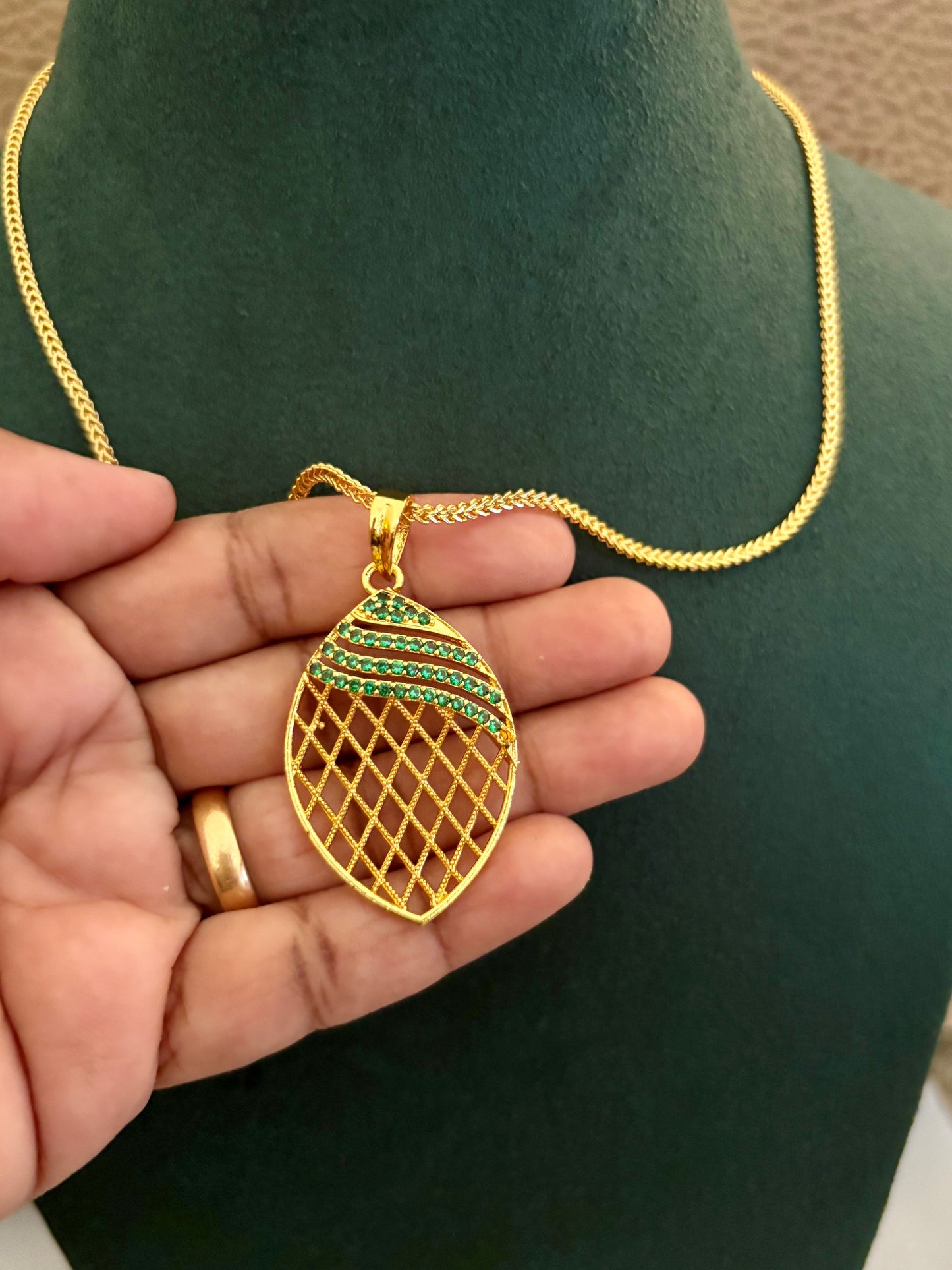 Gold-Plated Jali Work Pendant with Green Emerald Stones